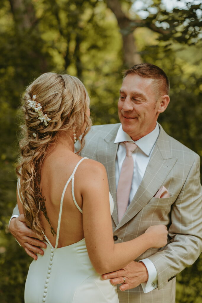 bride first look with dad