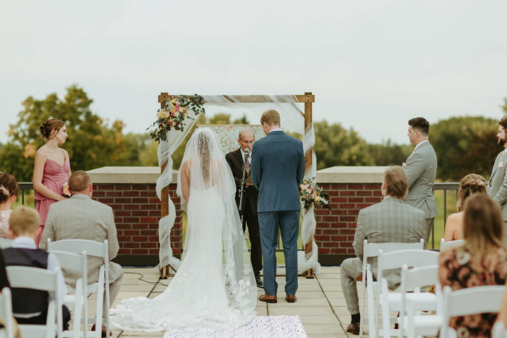 wedding ceremony overlooking golf course