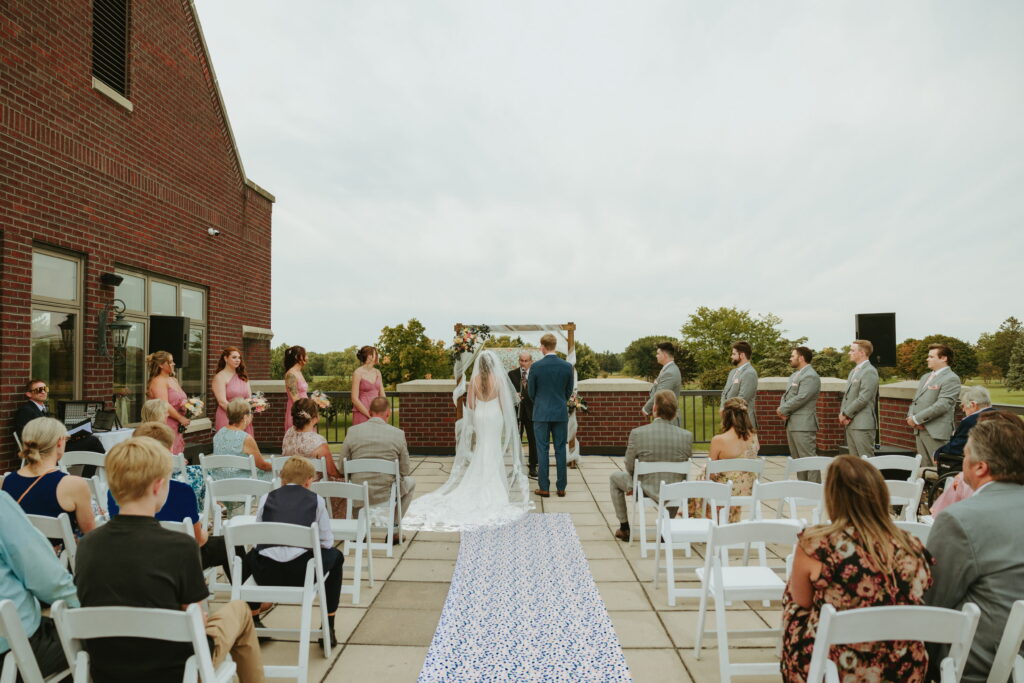 wedding ceremony overlooking golf course