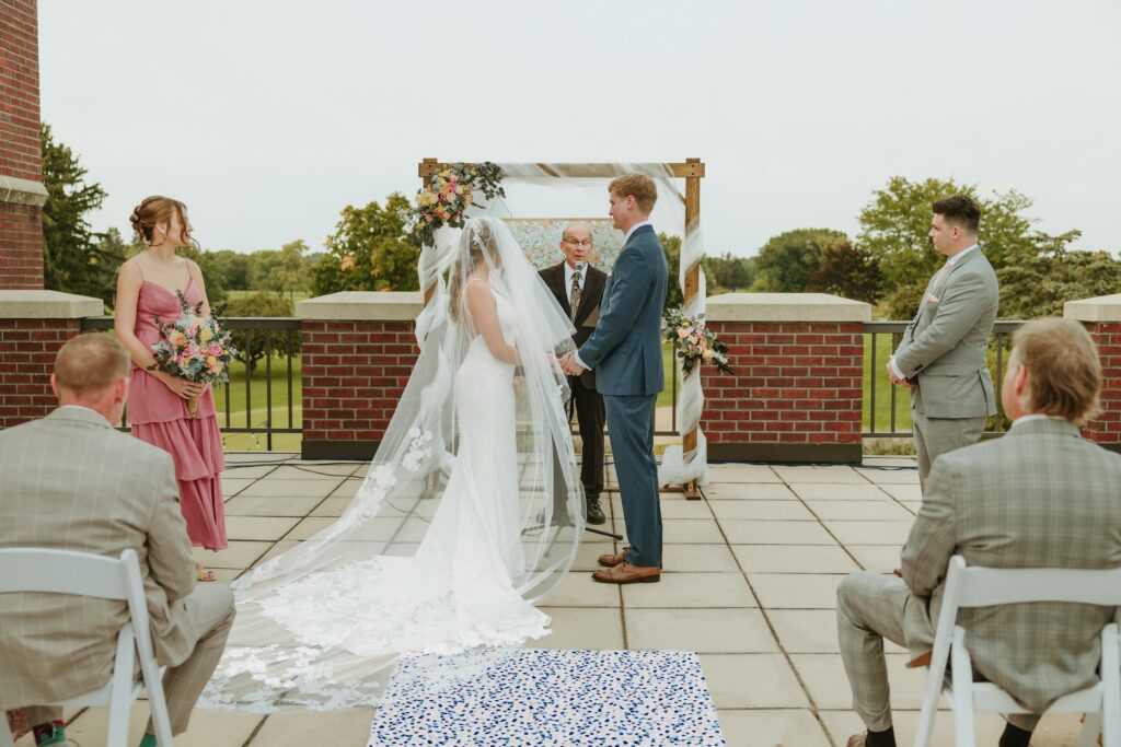 wedding ceremony overlooking golf course