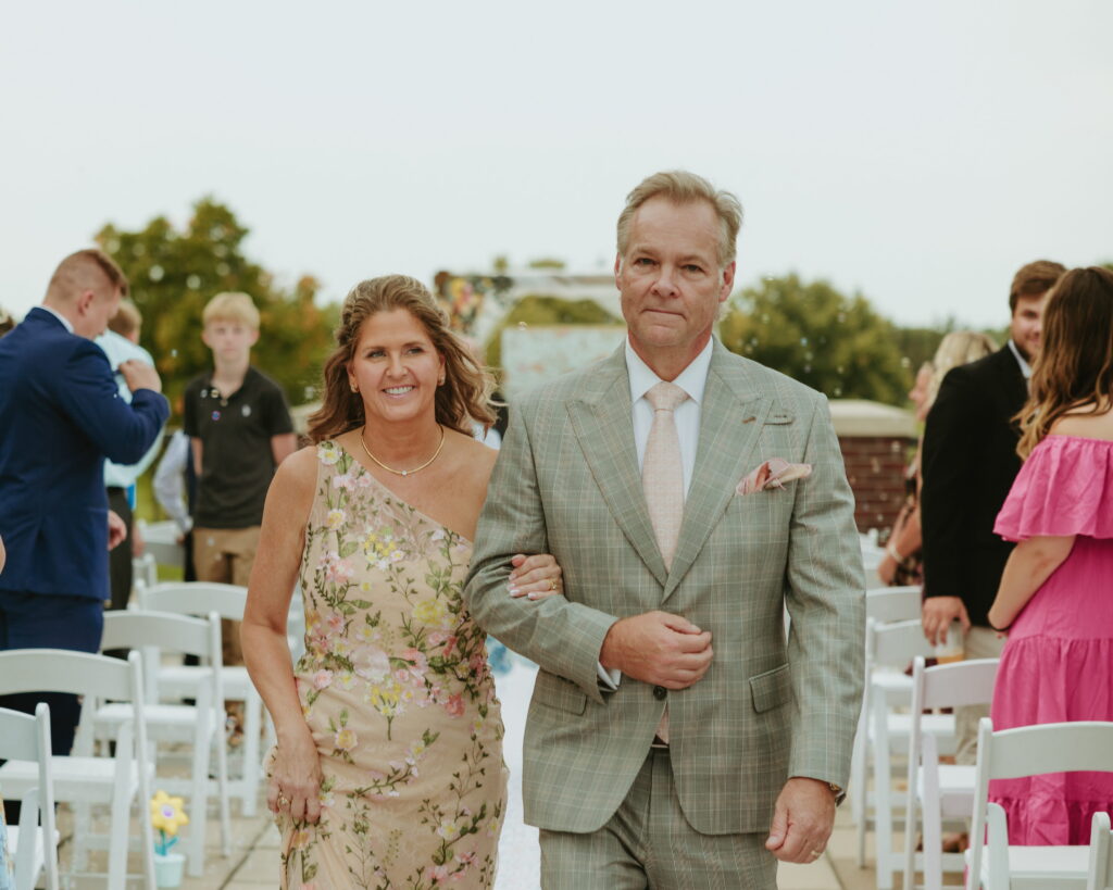 parents exiting wedding ceremony