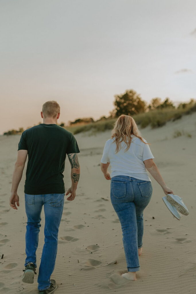 couple at beach for engagement pics
